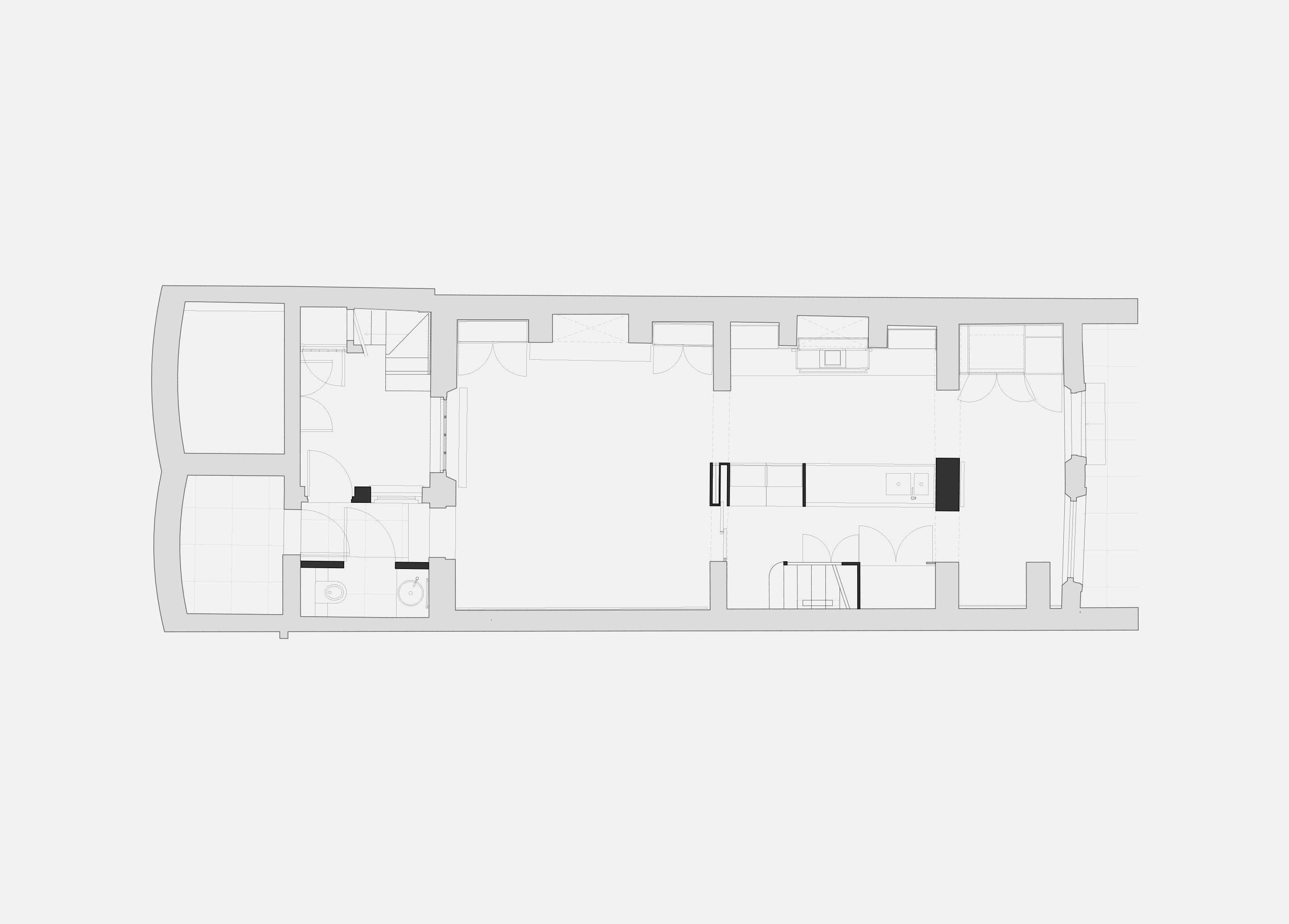 Floor plan of Puzzle Box showing a narrow linear arrangement of kitchen and dining room across the depth of the Victorian townhouse.