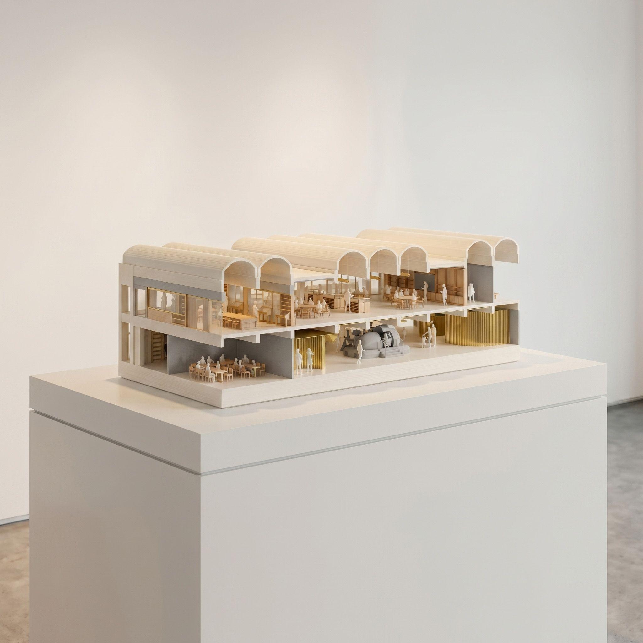 Sectional model of the Archive, Library and Research Centre at the RAF Museum, London, its vaulted roofs cut away to show the reading rooms above and the visitor spaces below