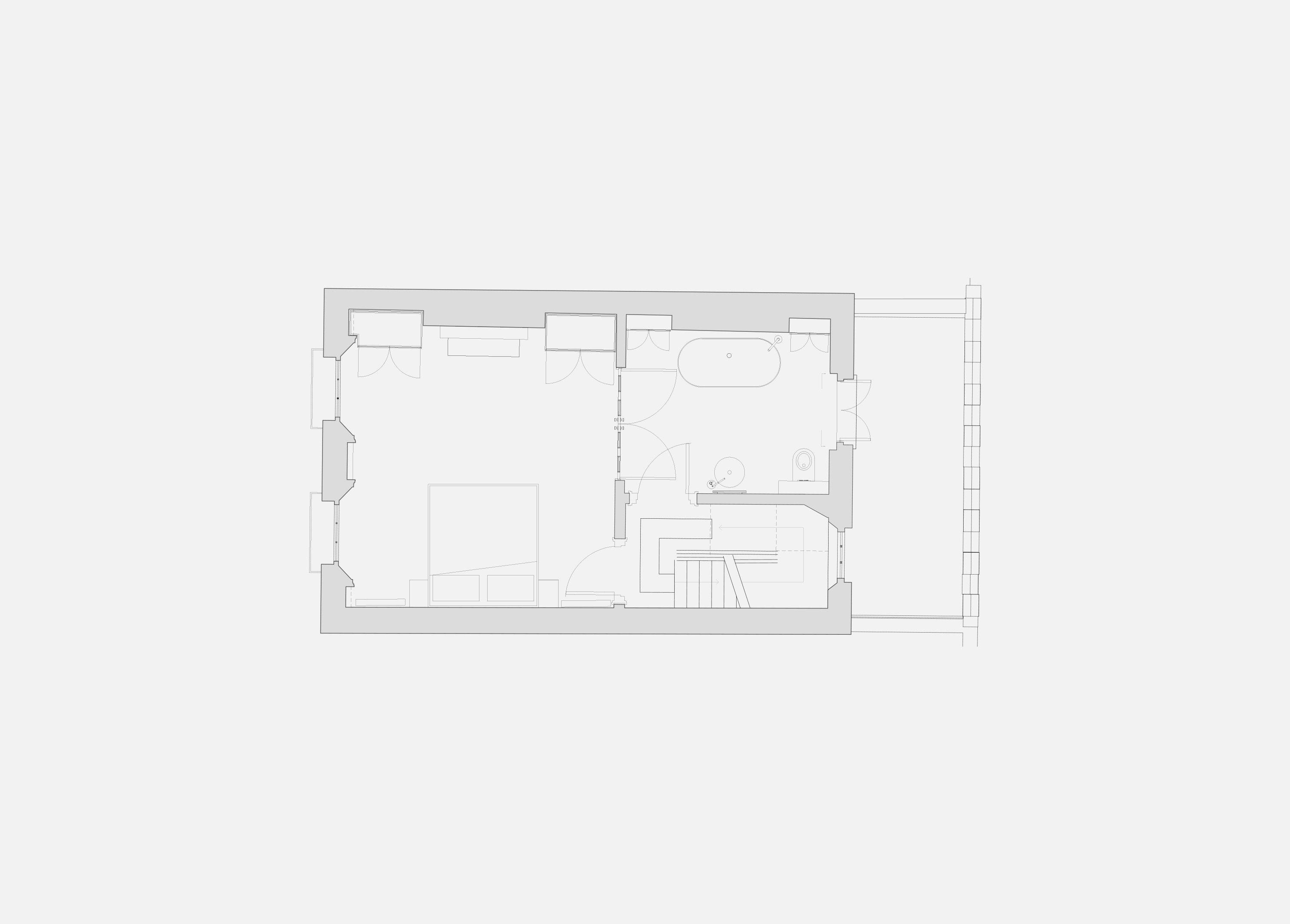 First floor plan of Puzzle Box showing a bedroom, bathroom and stair within the Victorian townhouse.