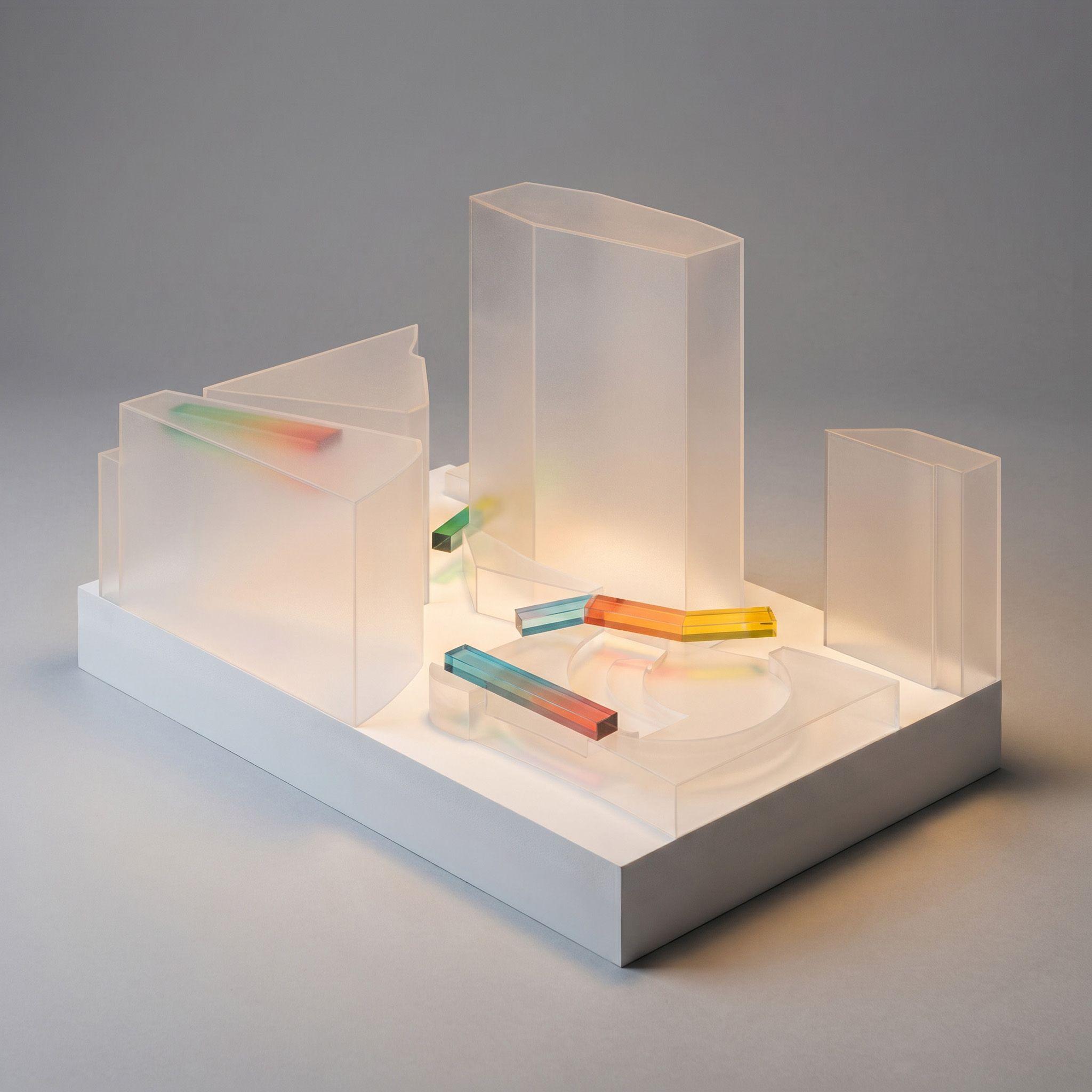 Study model for Cardinal Place, Victoria, coloured elements marking the position of each suspended installation within a pale massing of the surrounding buildings.