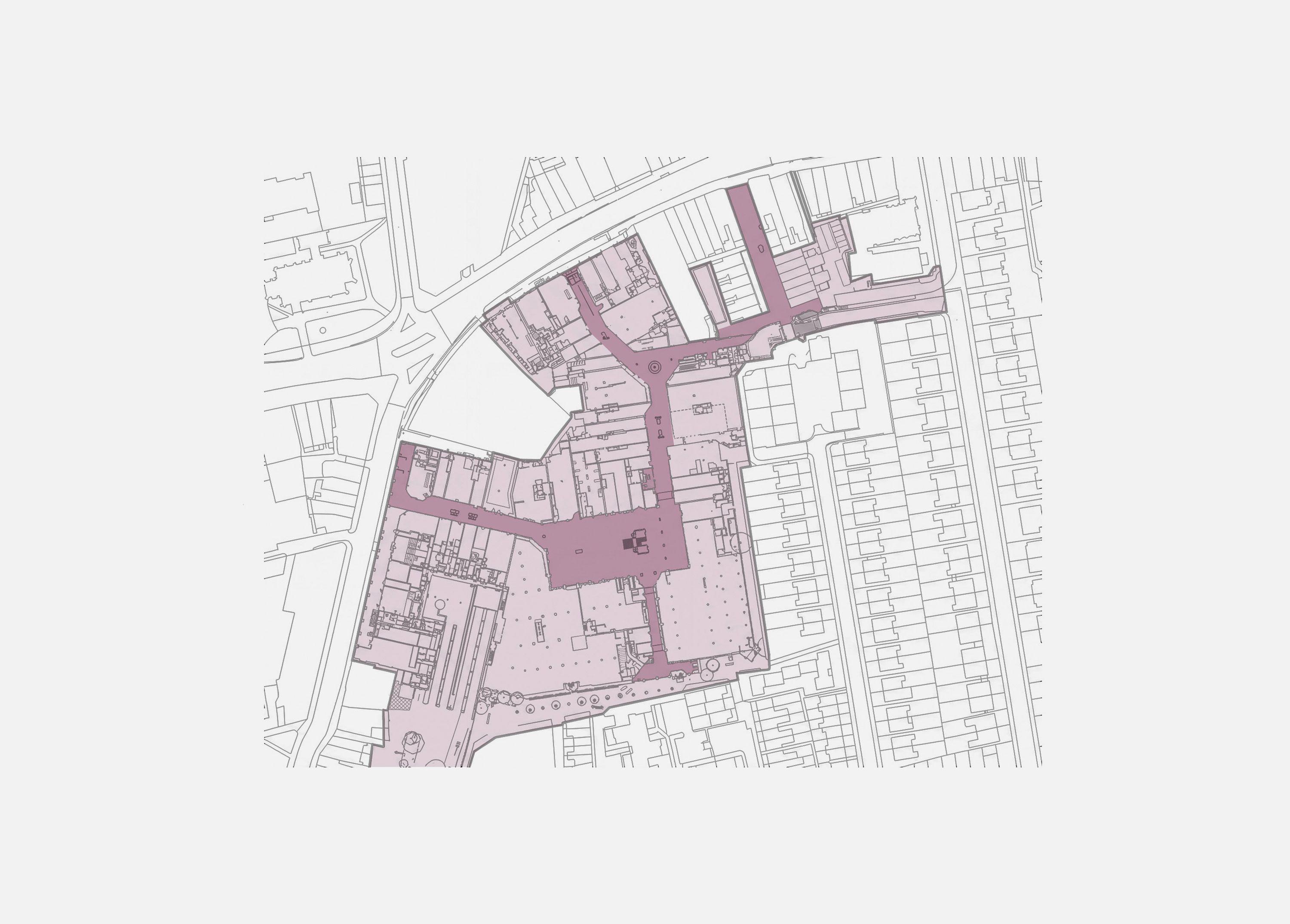 Site plan of Ealing Broadway showing the shopping centre block picked out in mauve within the surrounding street pattern and terraced housing.