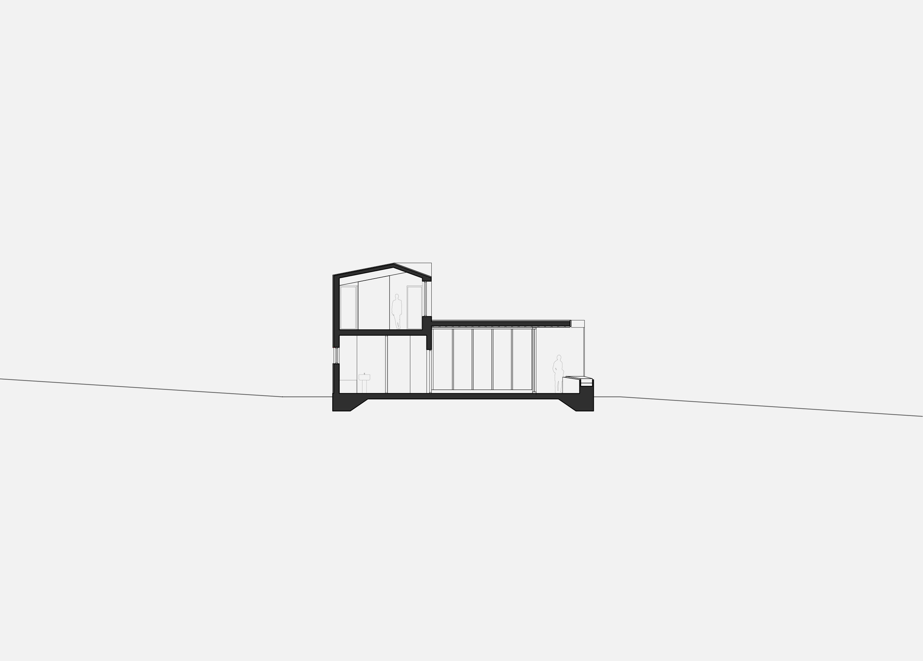 Section drawing through Keeping House at Liscannor, showing the pitched cottage volume with a room in the roof and the lower link running out from it across the slope of the hill.