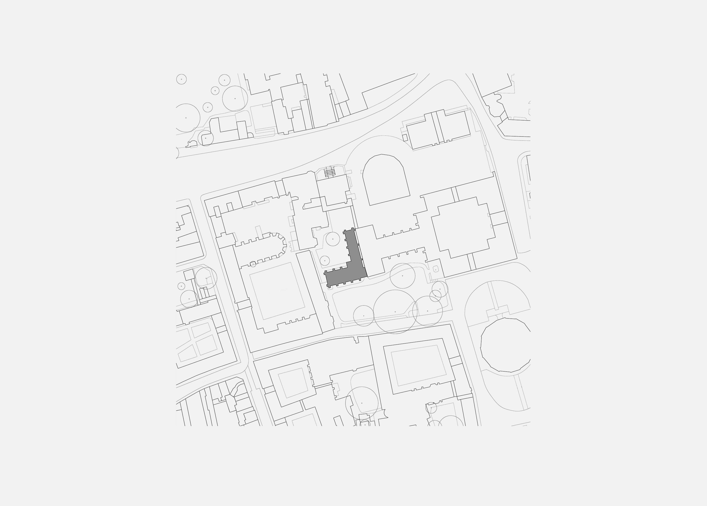 Line drawing site plan showing the L-shaped range of Exeter College Library, Oxford, set among the surrounding quads, gardens and historic buildings in the centre of the city.