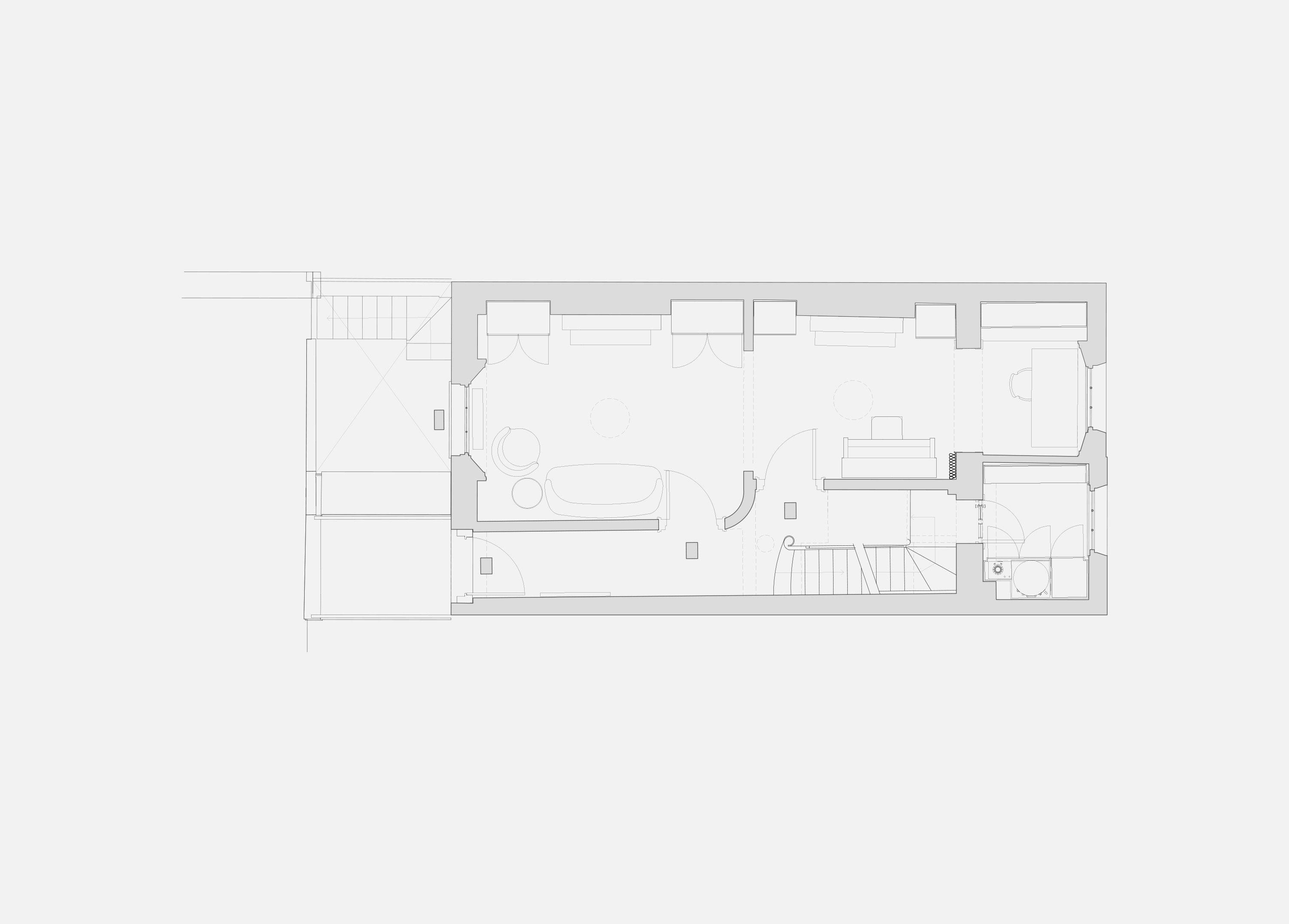 Ground floor plan of Puzzle Box showing living rooms, stair and kitchen arranged along the depth of the Victorian townhouse.